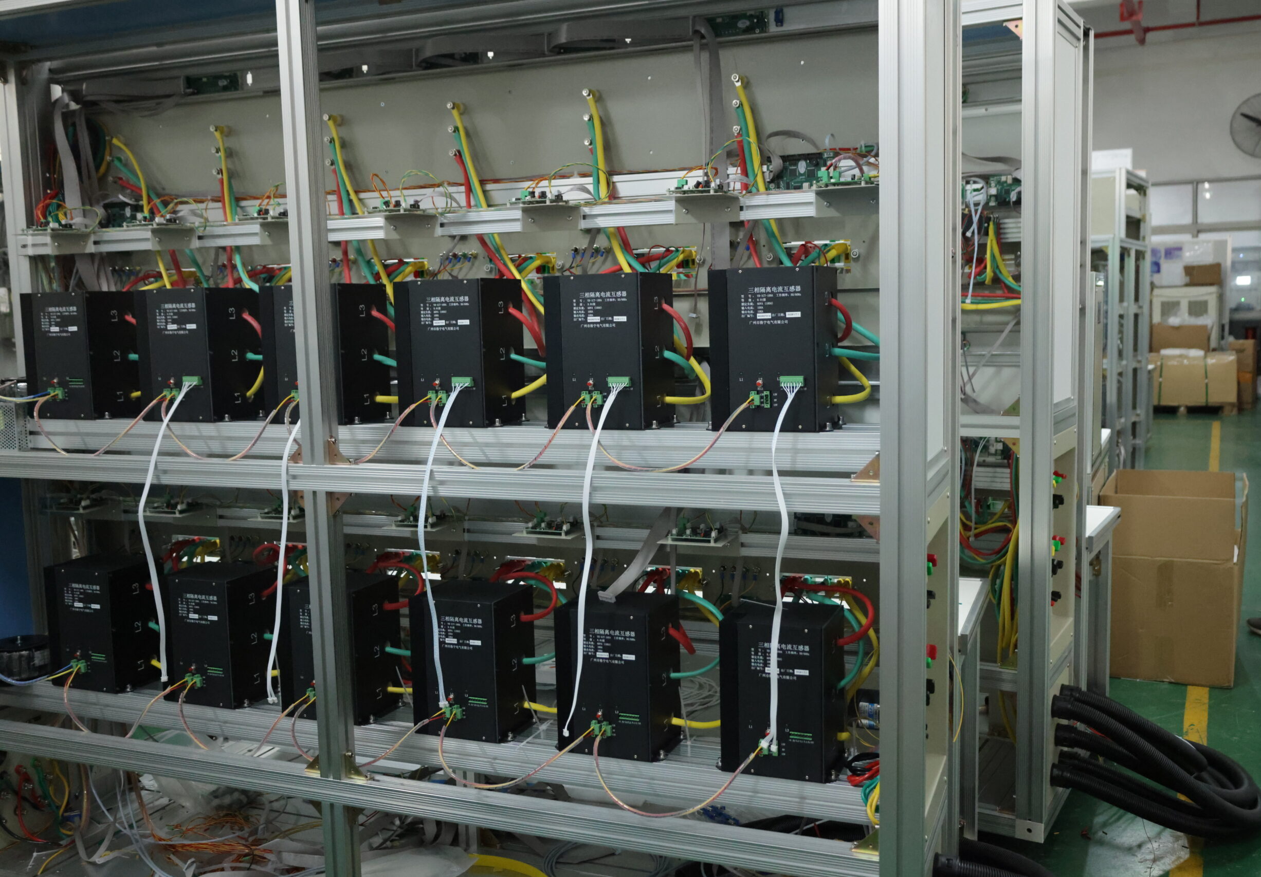 GENY manufacturing facility production line - high-volume meter testing equipment assembly